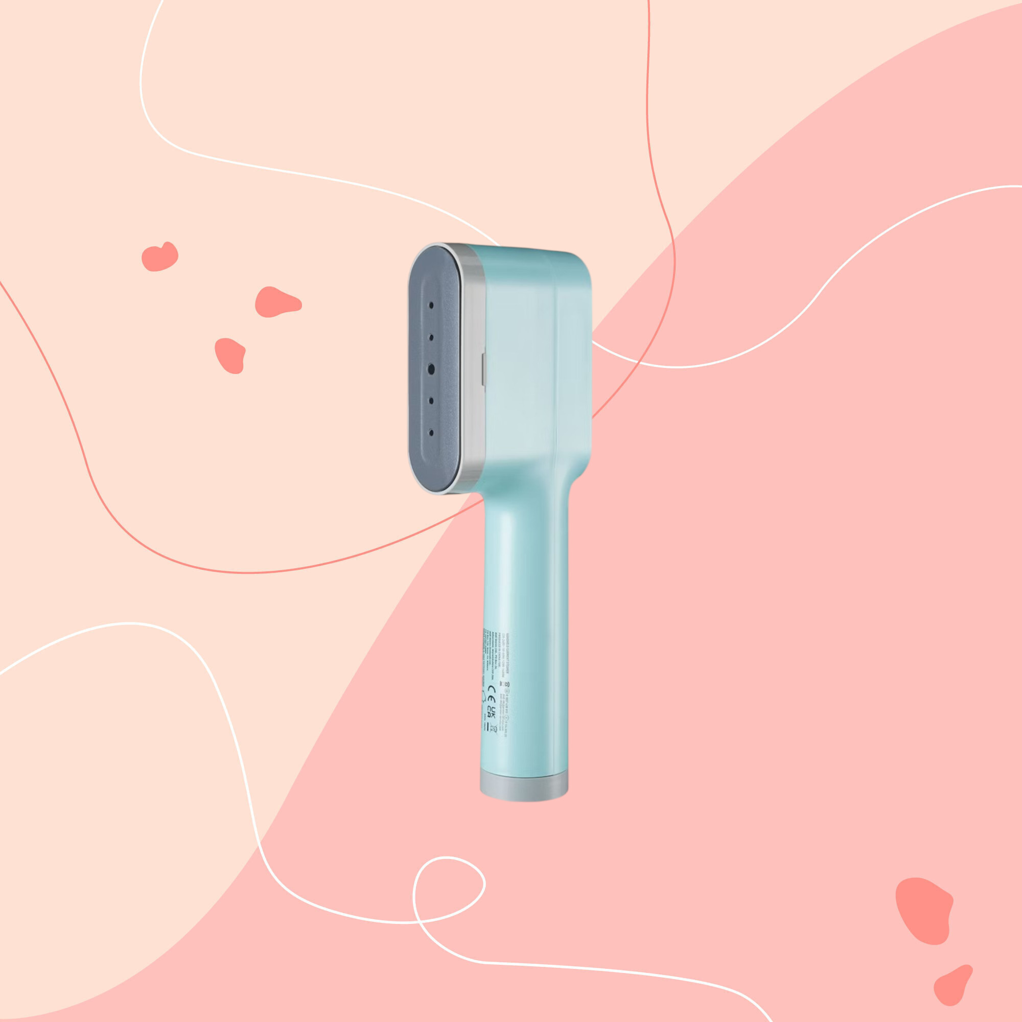 aldi clothes steamer on pink graphic background