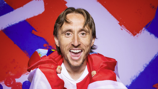  Luka Modric of Croatia poses wrapped in the Croation flag ahead of Spain vs Croatia Euro 2024