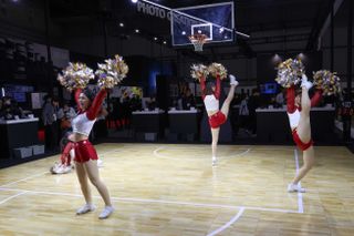 Canon PowerShot V1 sample image of cheerleaders on a basketball court