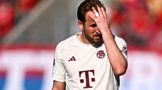 Harry Kane looks dejected during Bayern Munich's 3-2 loss against Heidenheim in April 2024.
