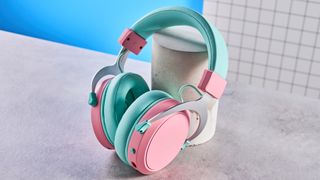 A pink and teal Cooler Master CH351 wireless gaming headset