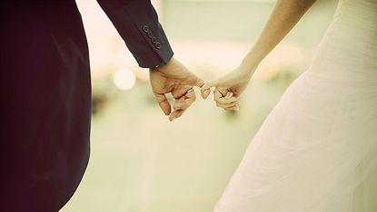 Finger, Joint, Bridal clothing, Wrist, Dress, Wedding dress, Gesture, Bride, Ceremony, Gown, 