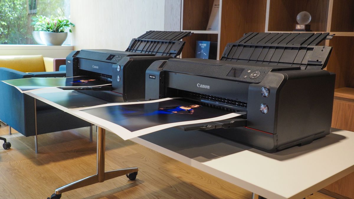 A Canon ImagePrograf Pro-1100 printer side by side with a Canon ImagePrograf Pro-1000