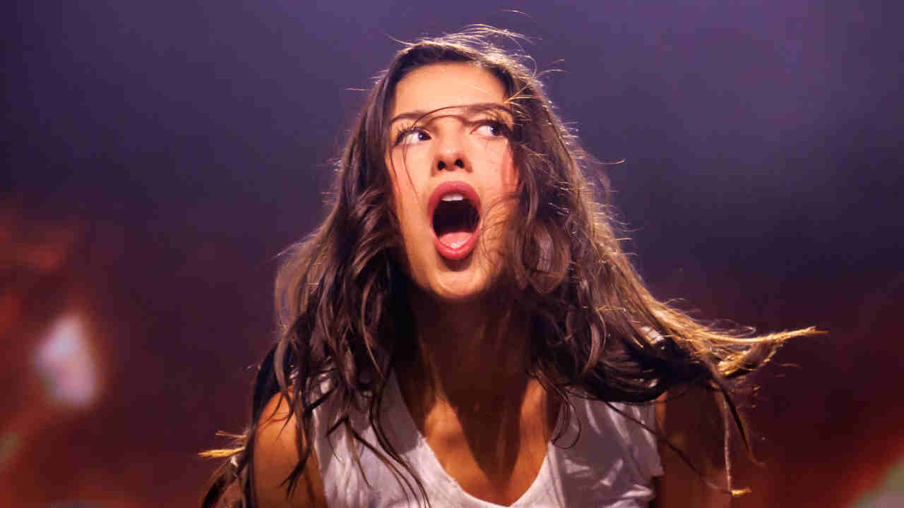 Olivia Rodrigo performing onstage in 2026