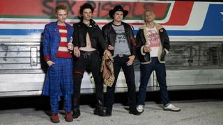 Sex Pistols lined-up by the tour bus in Pistol