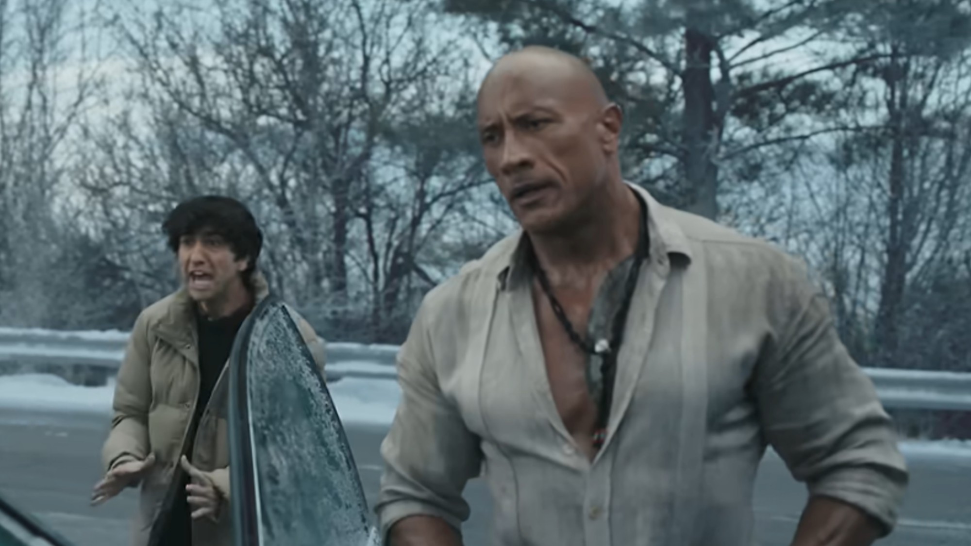Dwayne Johnson standing on a highway in Jumanji: Open World