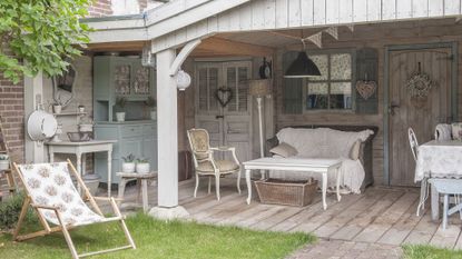 Dutch veranda garden room with vintage furniture
