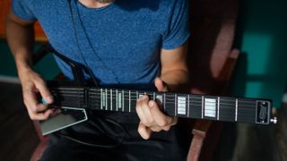Jammy G Midi Guitar in use indoors