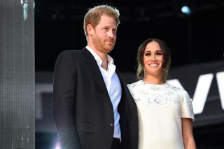 Prince Harry, Duke of Sussex and Meghan, Duchess of Sussex speak onstage during Global Citizen Live
