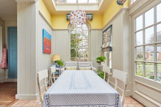 orangery ideas using bright colors and printed fabrics by Edward Bulmer