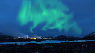 Northern lights over the Blue Lagoon, Iceland.