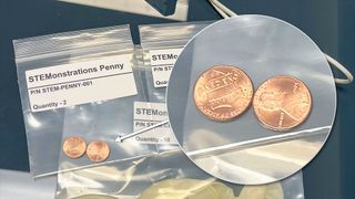 closeup of two pennies inside a sealed plastic baggie