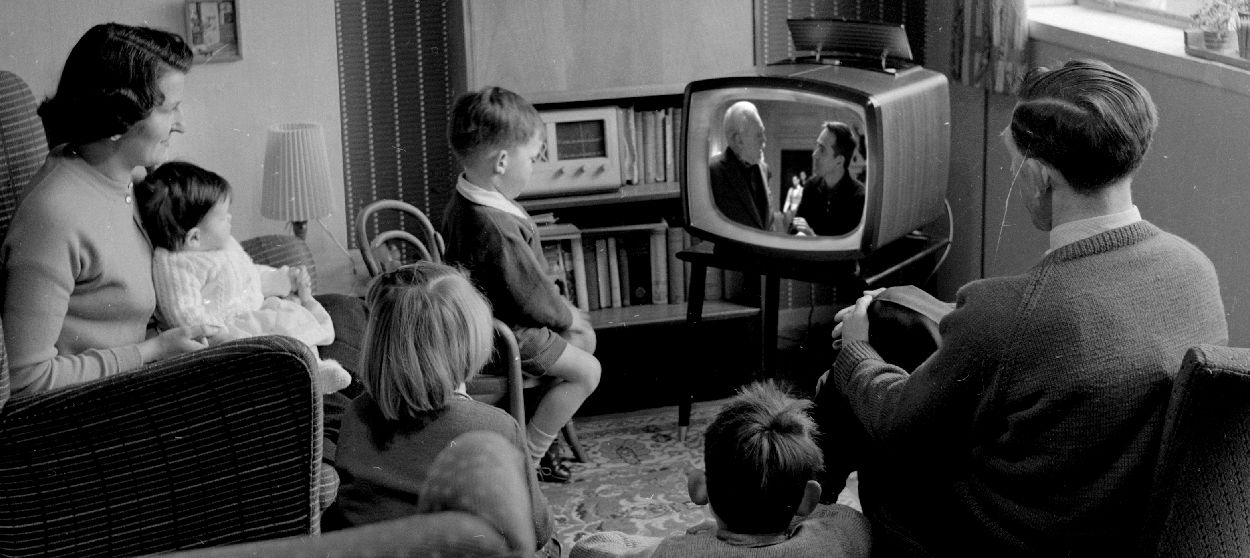 A family watching TV.