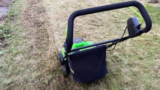 Greenworks 40V 14in Cordless Dethatcher / Scarifier being tested in writer's home
