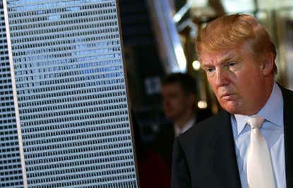 Donald Trump defends garish 20-foot sign in Chicago