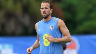 Harry Kane of England looks on during a training session