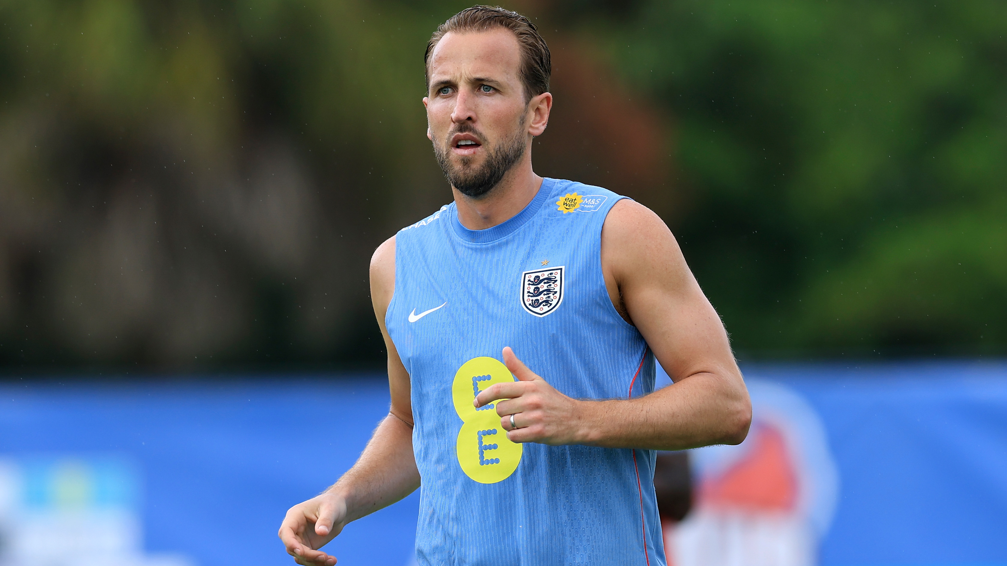 Harry Kane of England looks on during a training session