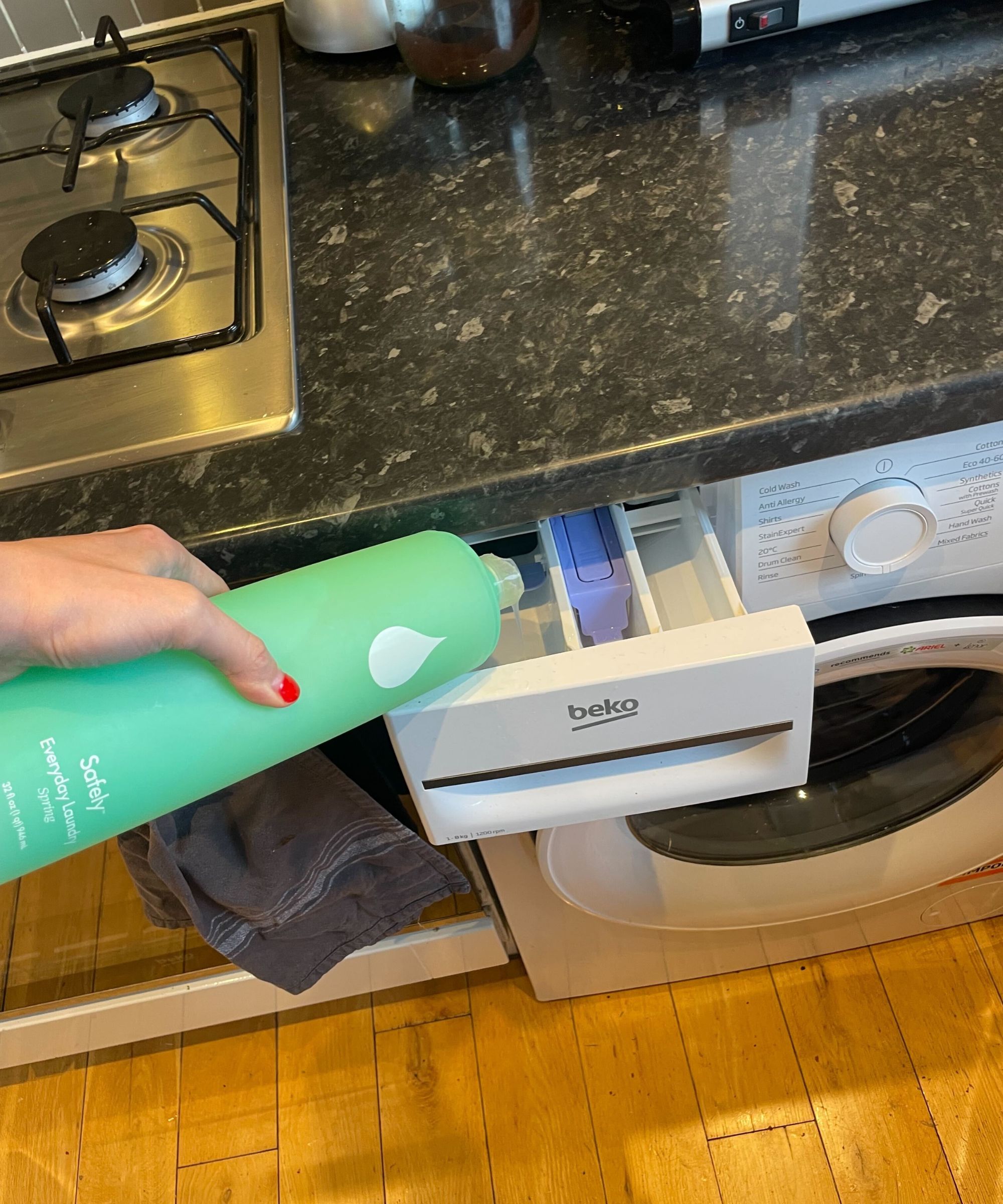 doing laundry using kris jenner's safely laundry detergent