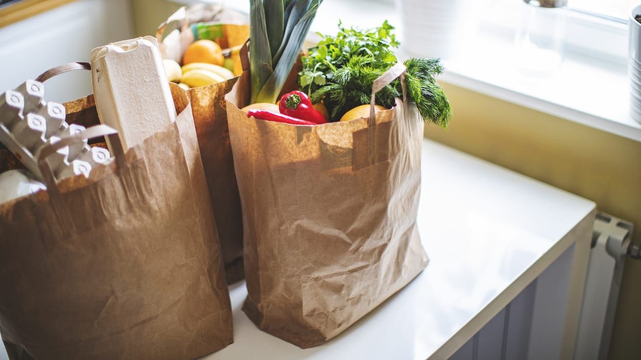 Groceries on a kitchen counter.