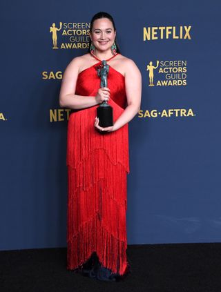 Lily Gladstone poses at the 30th Annual Screen Actors Guild Awards.