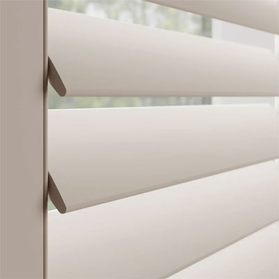 white wooden window shutters