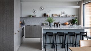 a modern kitchen with decorated kitchen countertops