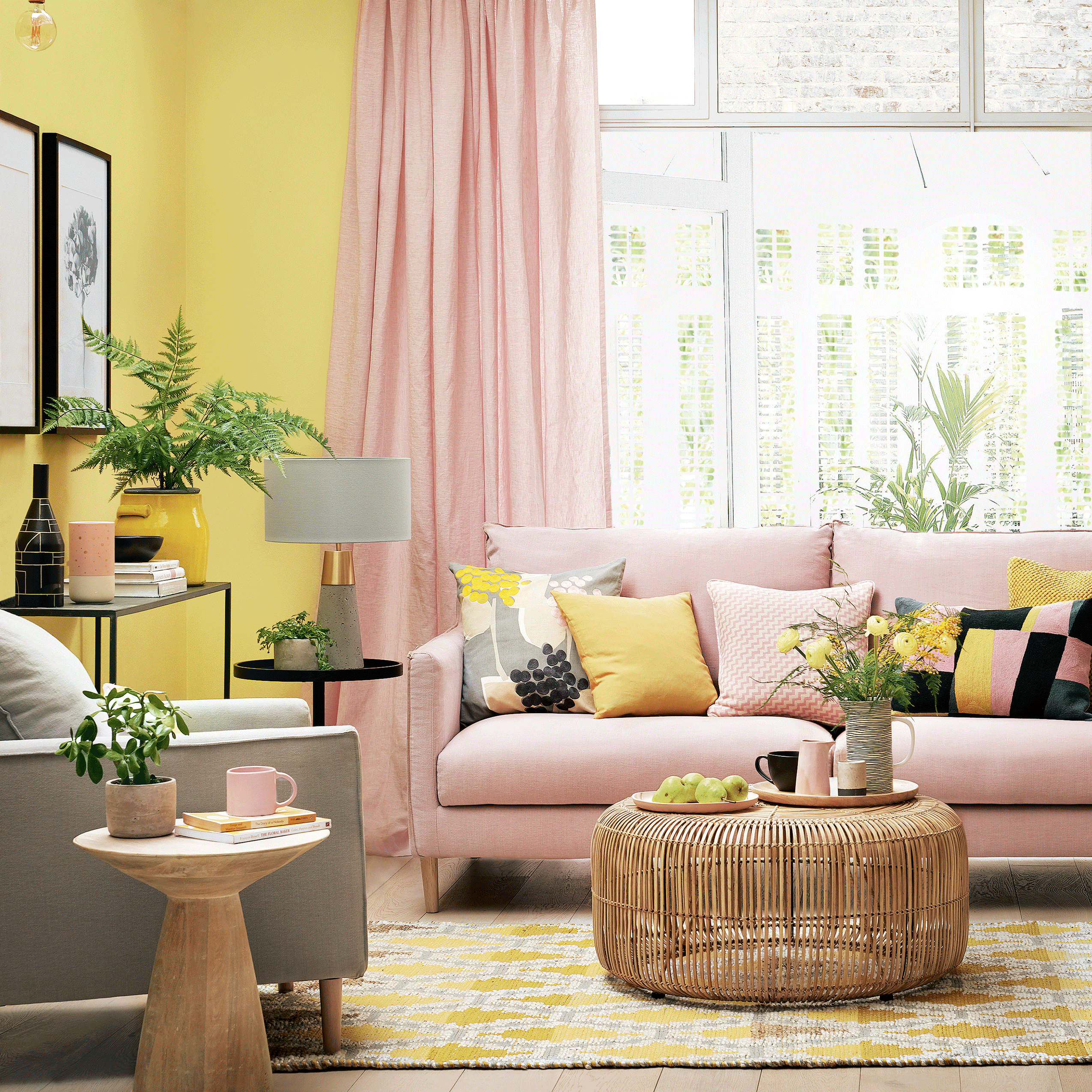 living room with photoframe on yellow wall and rug on floor