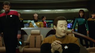 Data singing his "Lifeforms" song as a puzzled Enterprise Bridge crew watches him