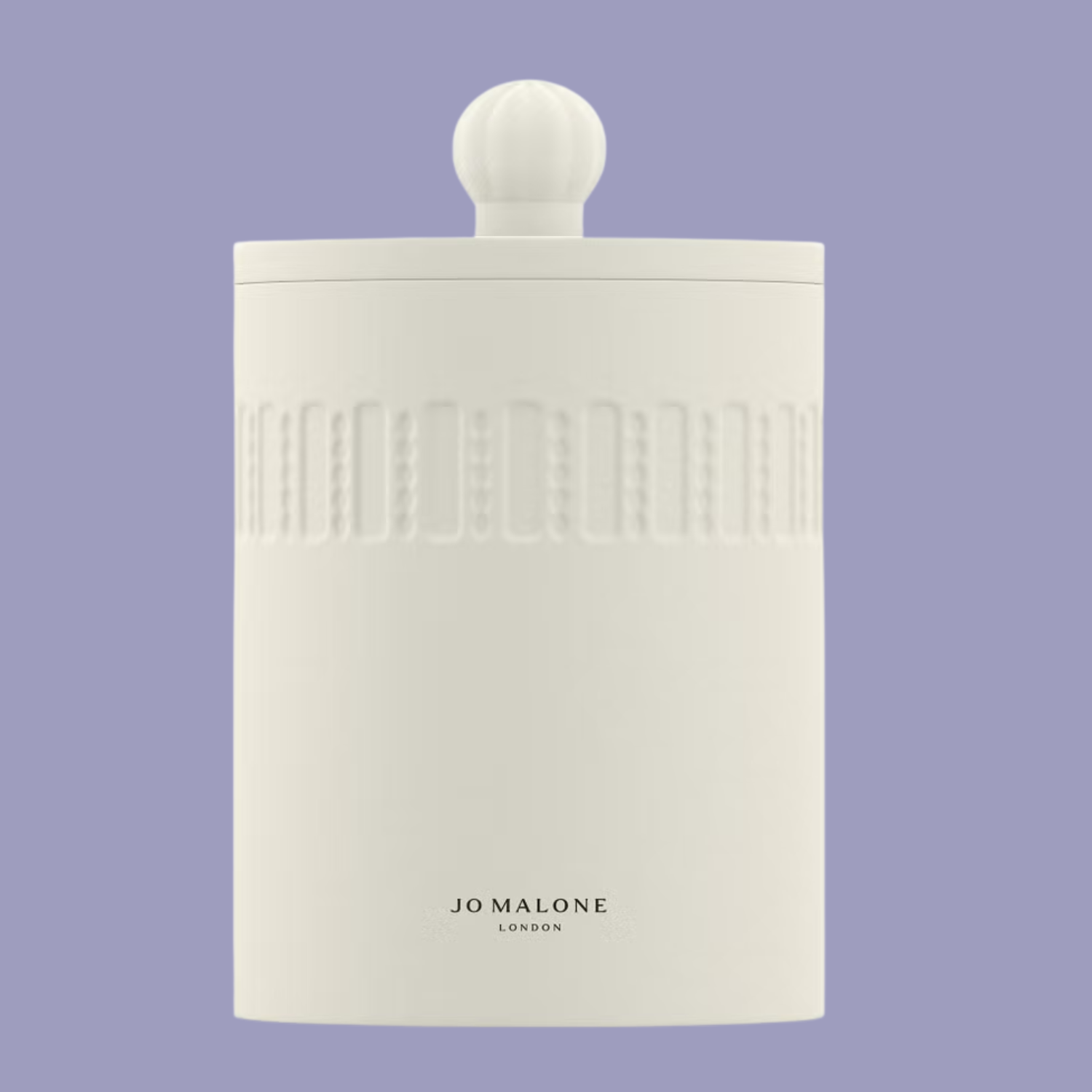A white Jo Malone candle with a lid