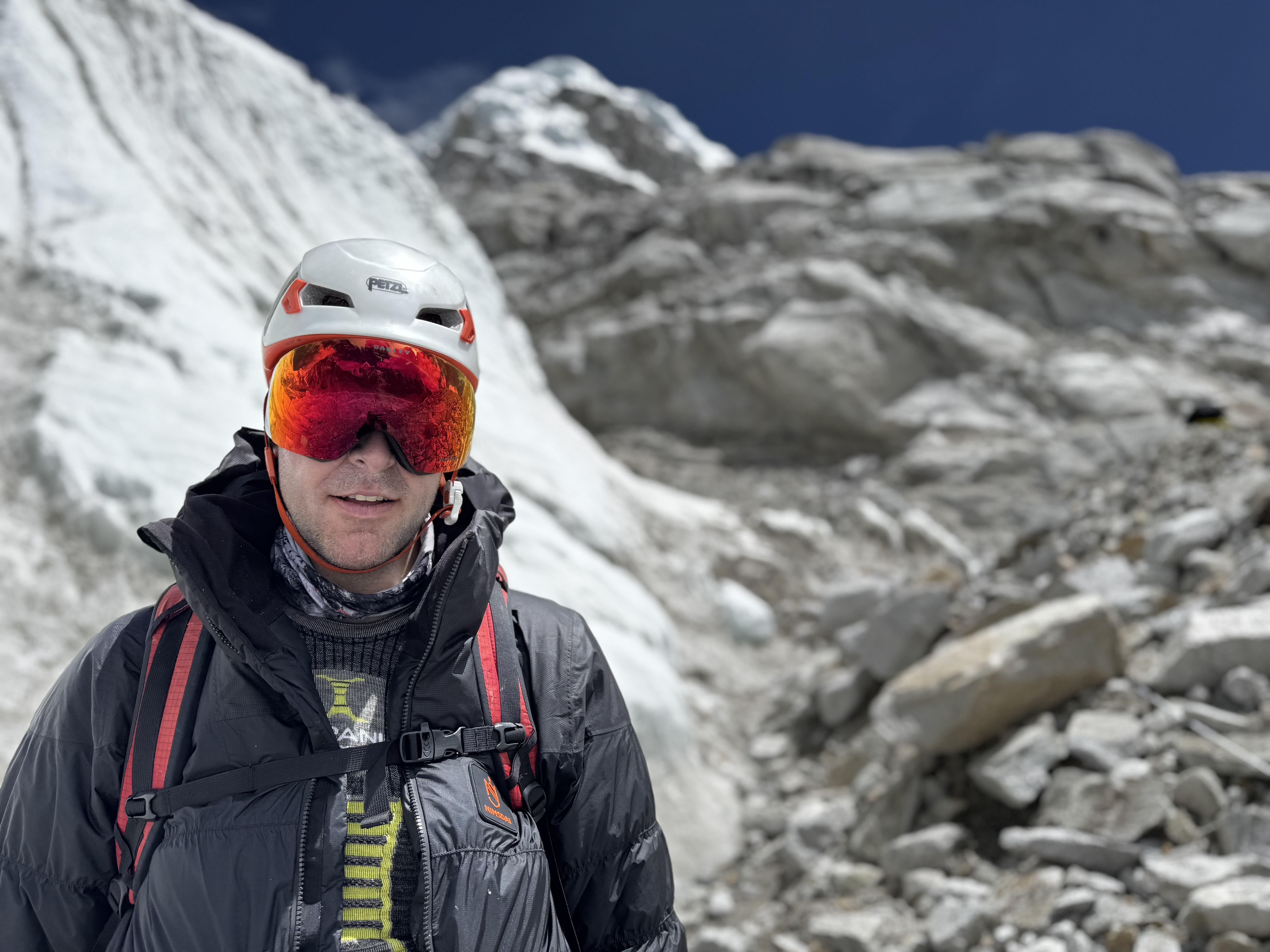 Andrew Ushakov wearing climbing helmet and goggles