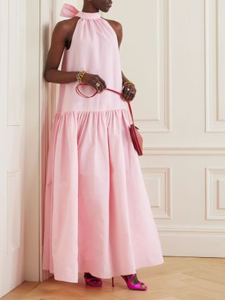 Net a Porter model in pink maxi dress