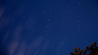 A night sky photograph taken with the Rebel SL3 shows ursa major