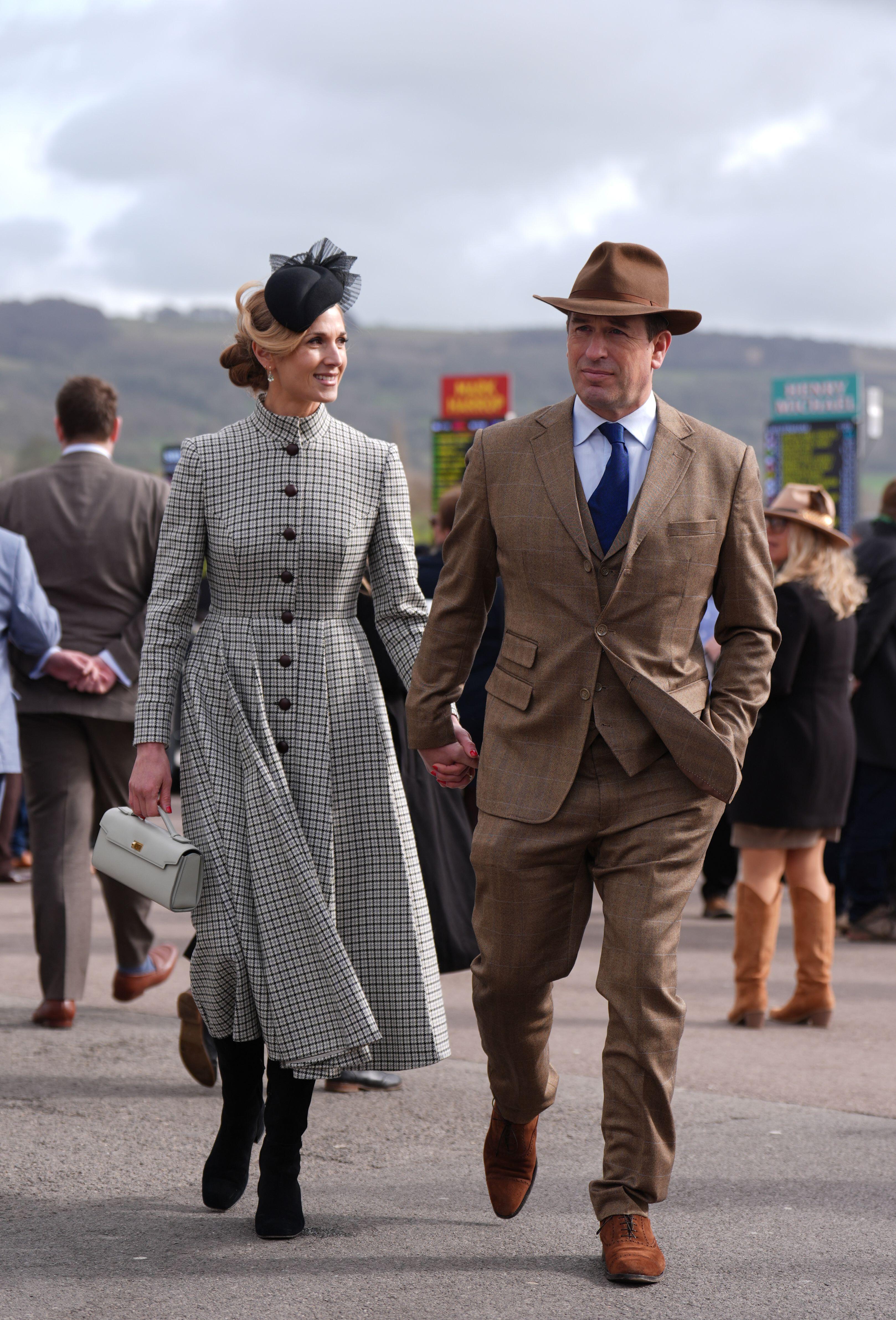 Harriet Sperling holding hands with Peter Phillips at Cheltenham Festival