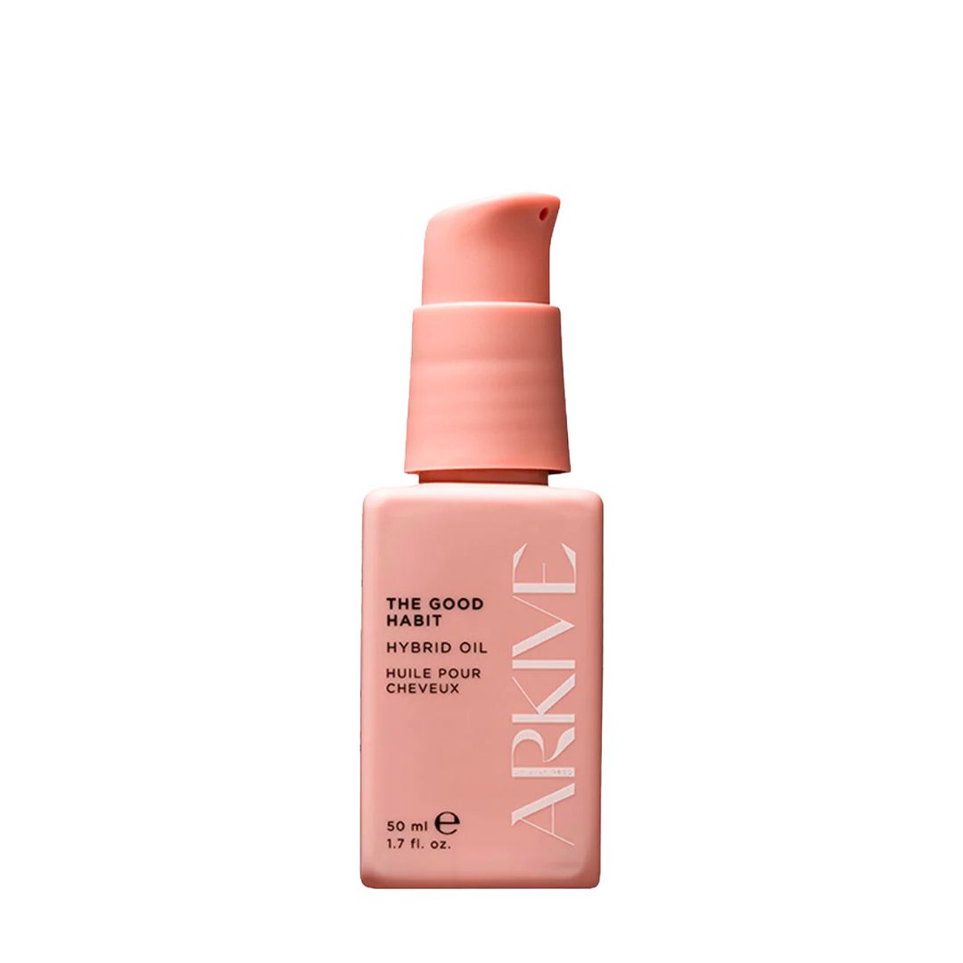 Product shot of ARKIVE The Good Habit Hybrid Oil in a pale pink bottle