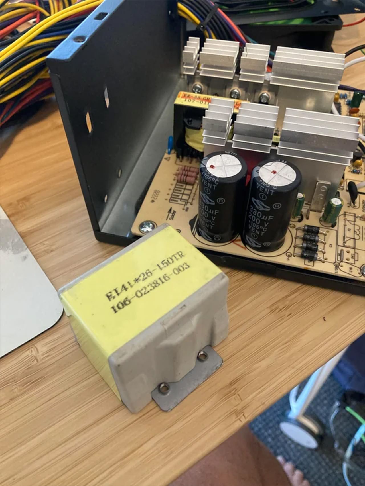 A teardown of a cheap PSU included with a budget PC case.