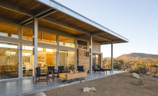 sustainable house and its entrance terrace