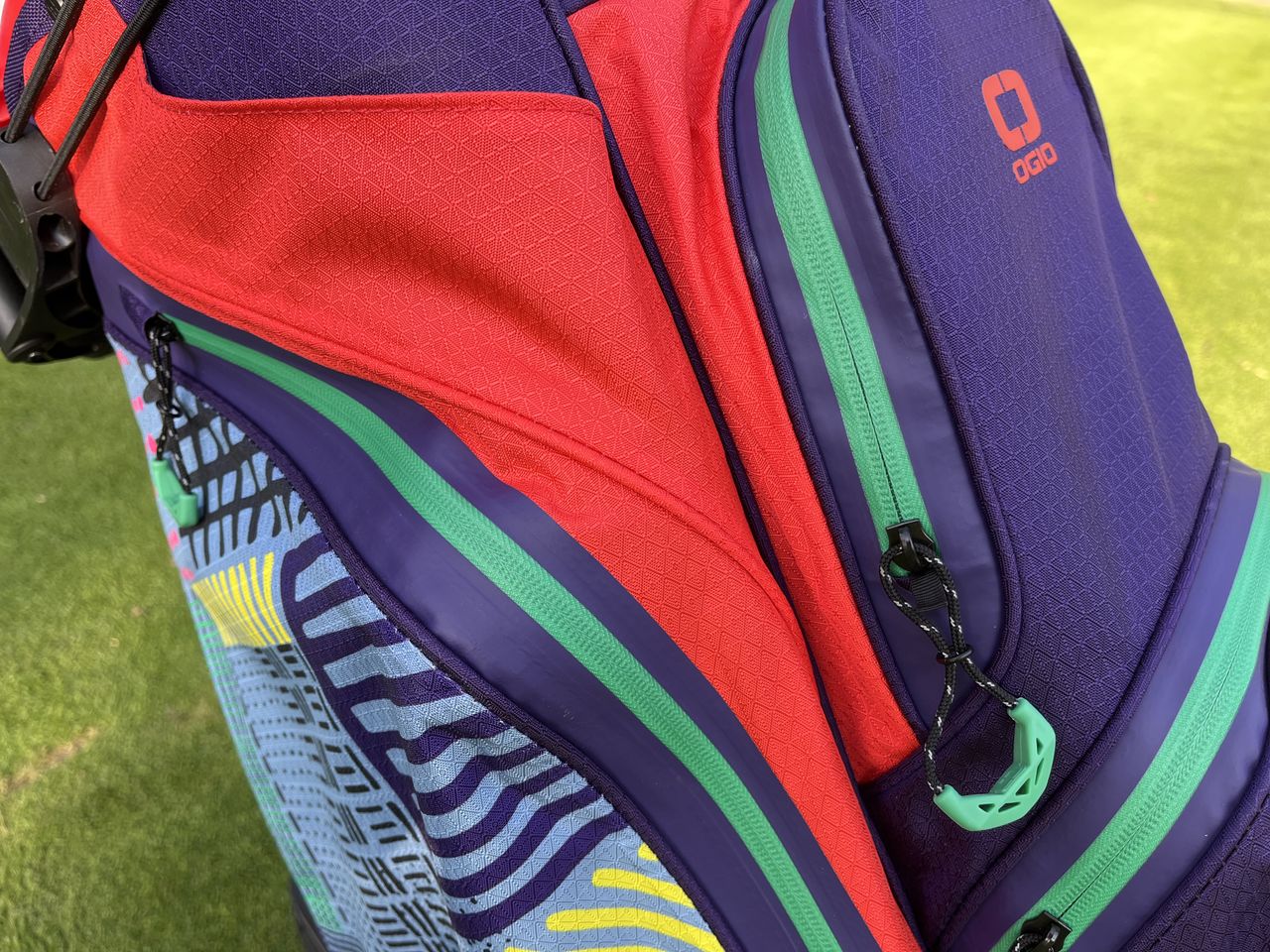 A close up of the seam sealed pockets on the All Elements Silencer cart bag