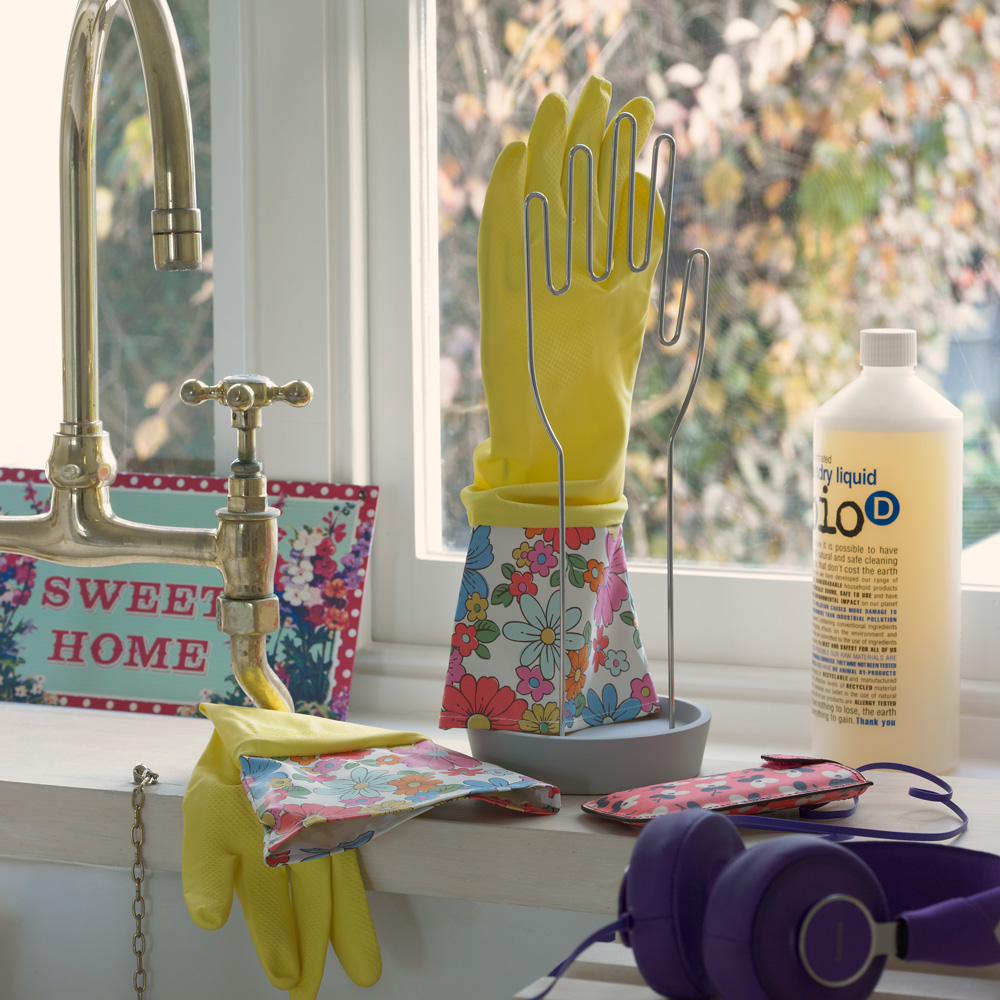kitchen with cleaning essentials and gloves