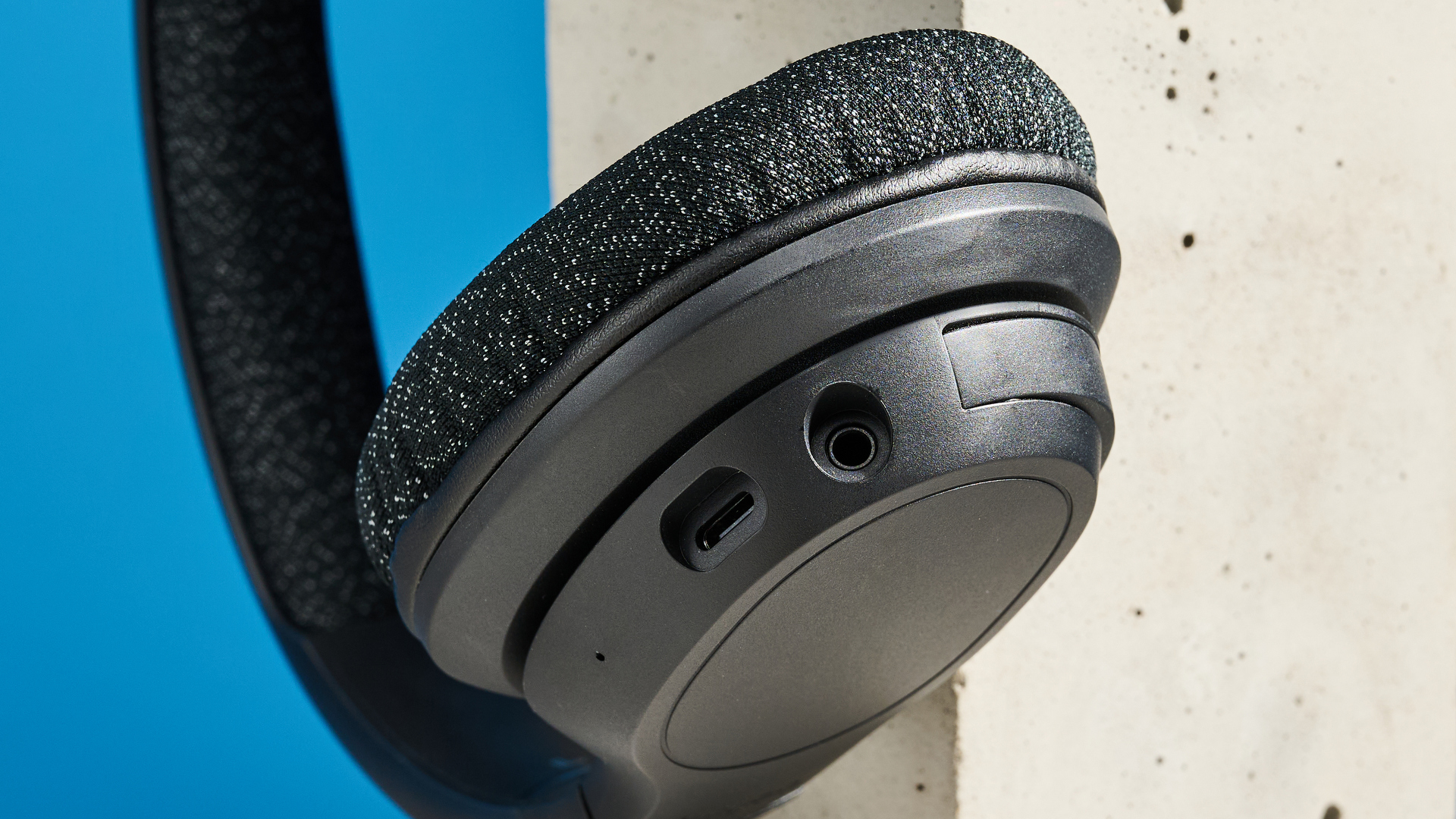 A black Belkin SoundForm Adapt wireless headset