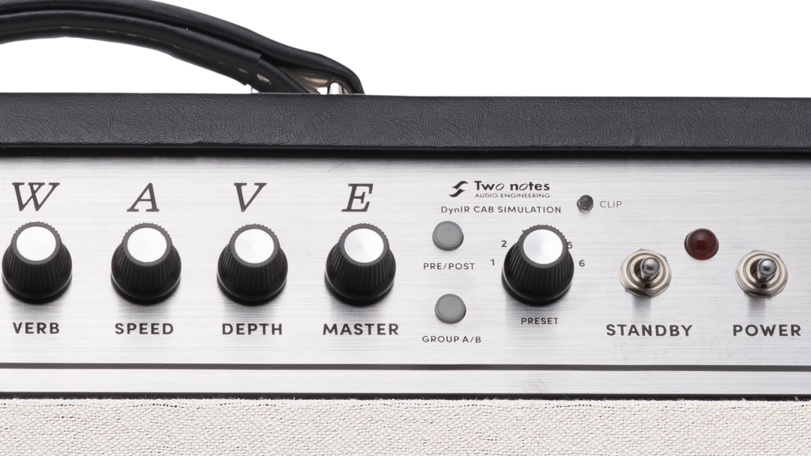 A photo showing a detail of the Supro Airwave 1x12 combo front panel