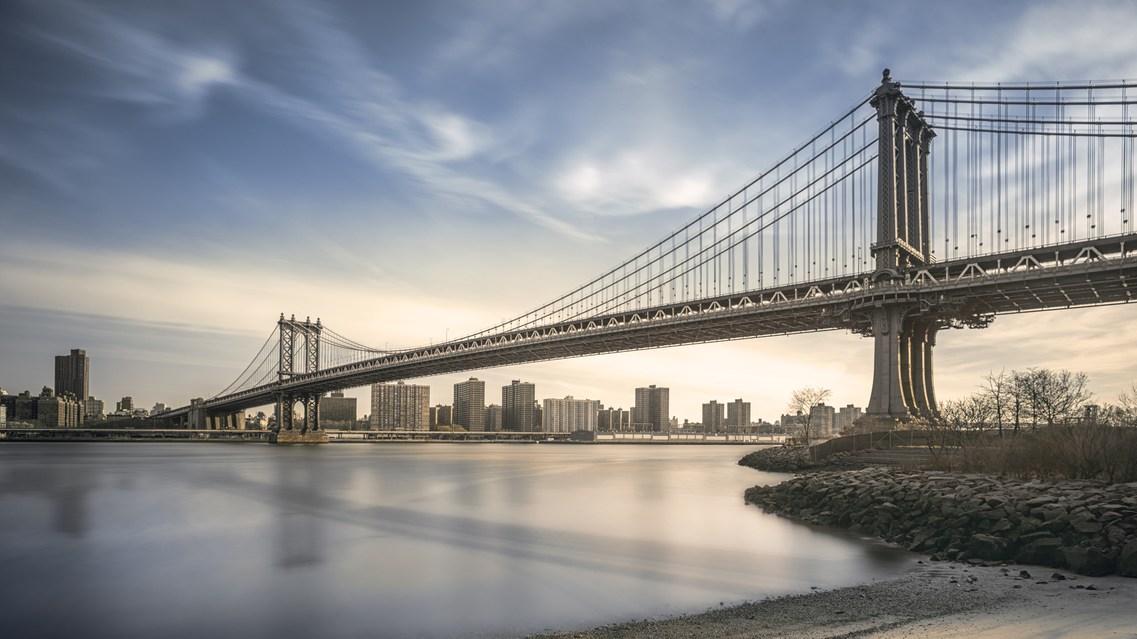 The Manhattan Bridge spans the East River in New York City