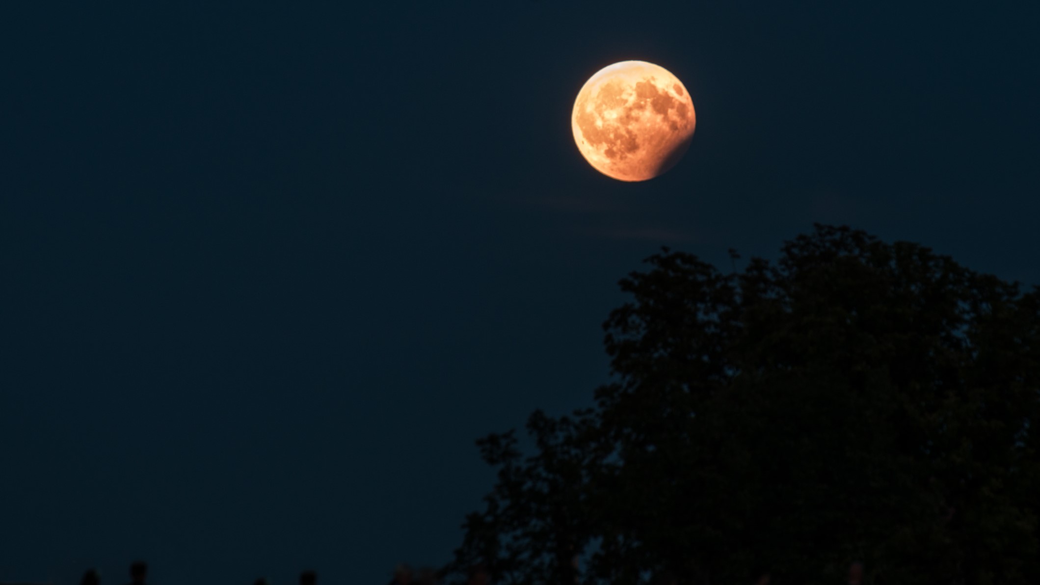 Full Hunter's Moon puts on a spooky display today with partial lunar eclipse