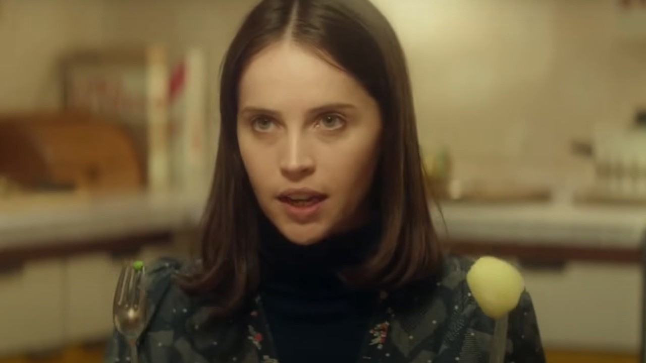 Felicity Jones discussing Stephen Hawking's ideas in The Theory of Everything