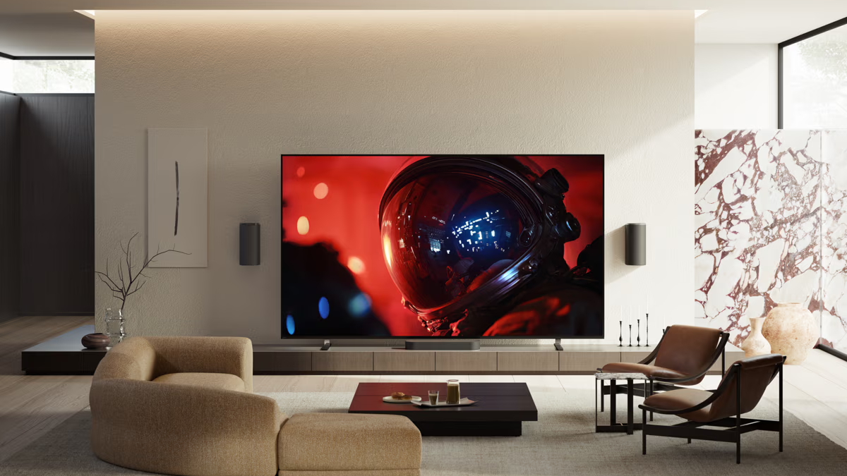 Sony Bravia 9 II in a white living room. The screen is displaying an image with an astronaut in a red setting with light reflecting off the helmet.