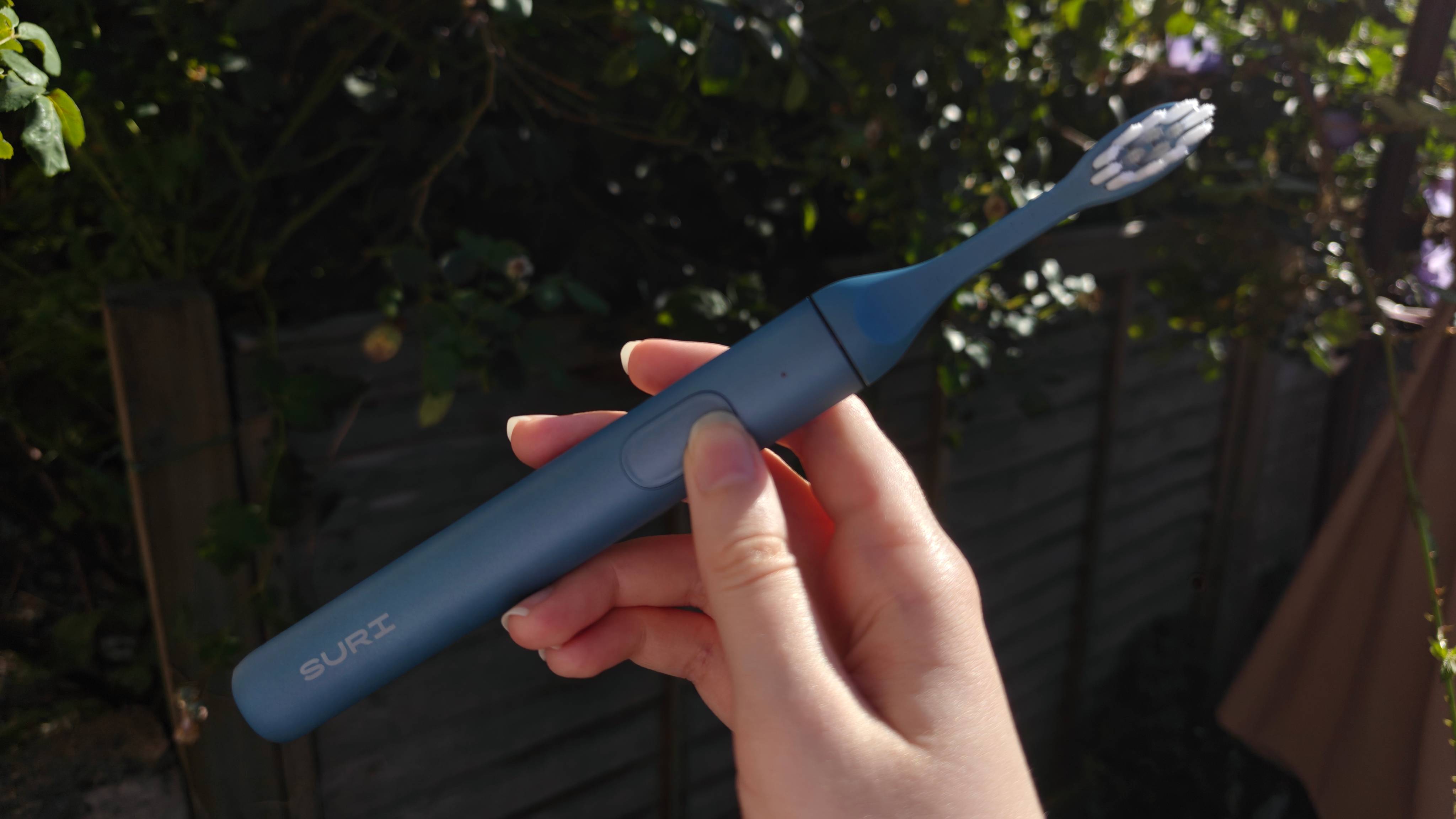 Suri 2.0 Electric Toothbrush outdoors
