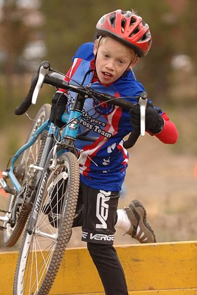 Aaron prefers to roll his bike between barriers.