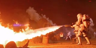 A flametrooper sets fire to this village on Jakku in Star Wars: The Force Awakens