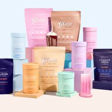 A variety of The Collagen Co. products including their collagen peptides and glow shakes, on a light blue backdrop.