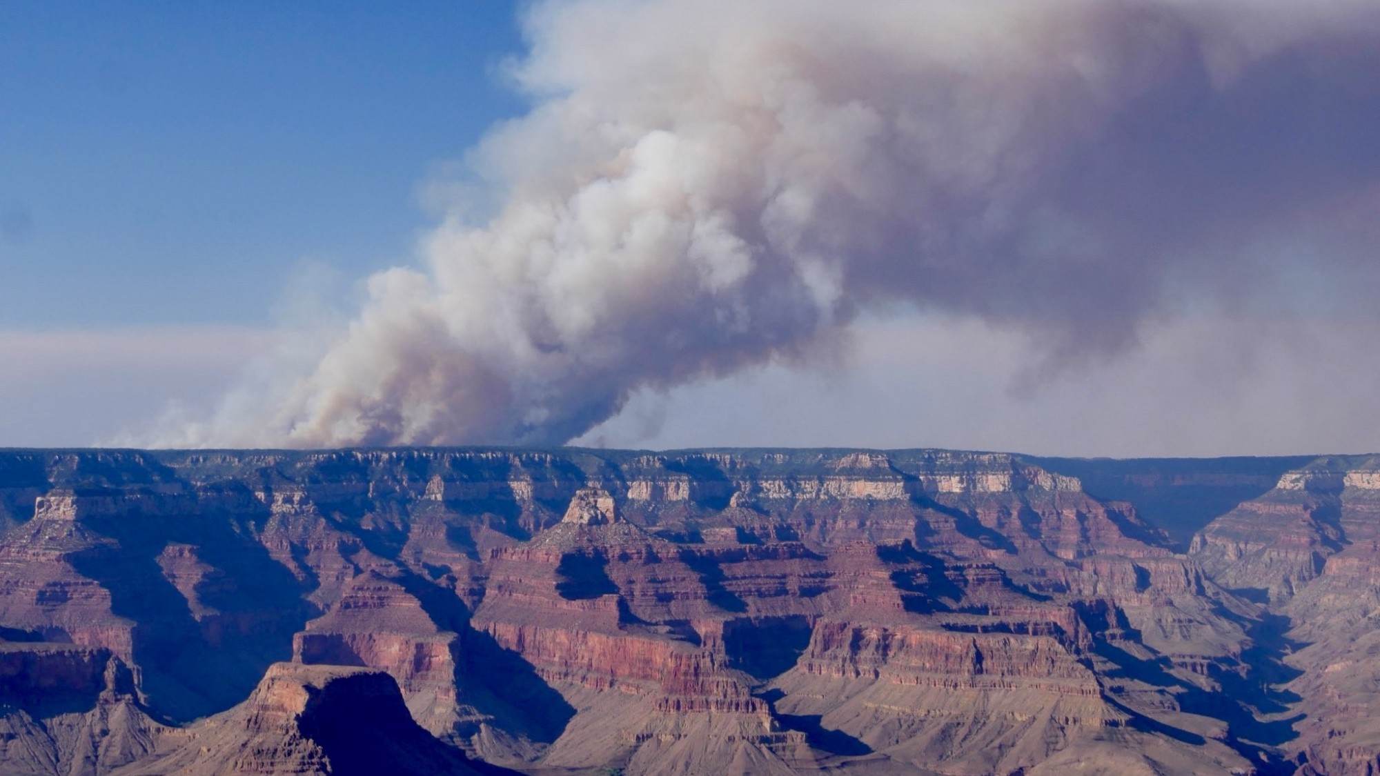 The Dragon Bravo wildfire burns over the Grand Canyon in July 2025. 