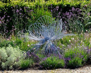 backyard with lavender and wire sculpture
